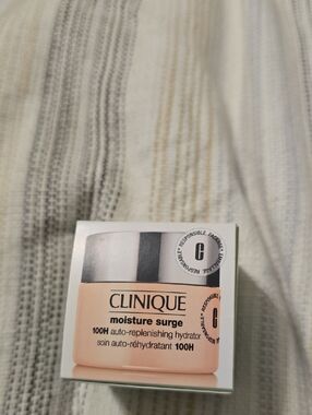 Clinique Moisture Surge Jar in Peach and White Packaging